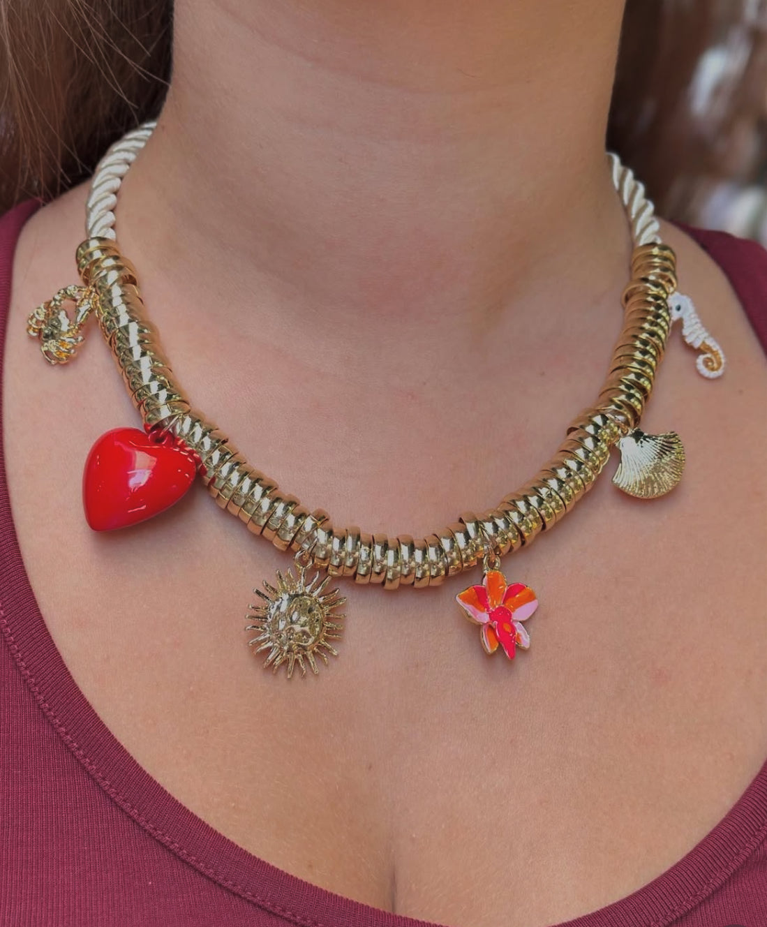 Cord necklace with golden charms