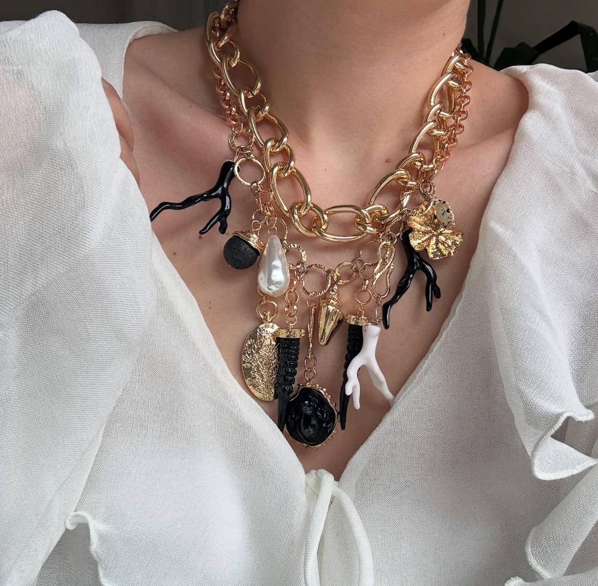 Double large chains with black charms