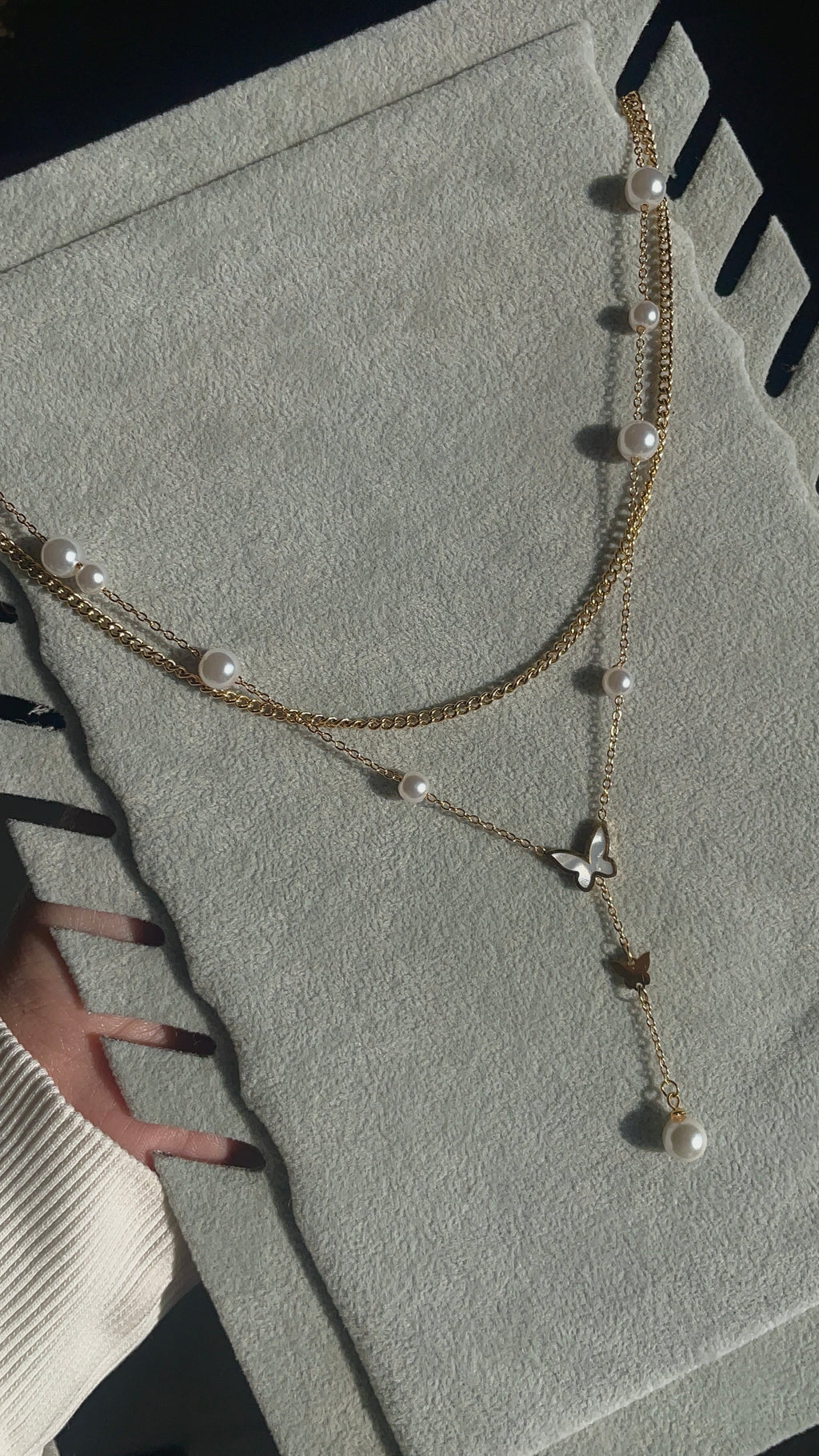 Butterfly pearl layered necklace