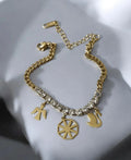 Tennis chain bracelet with charms