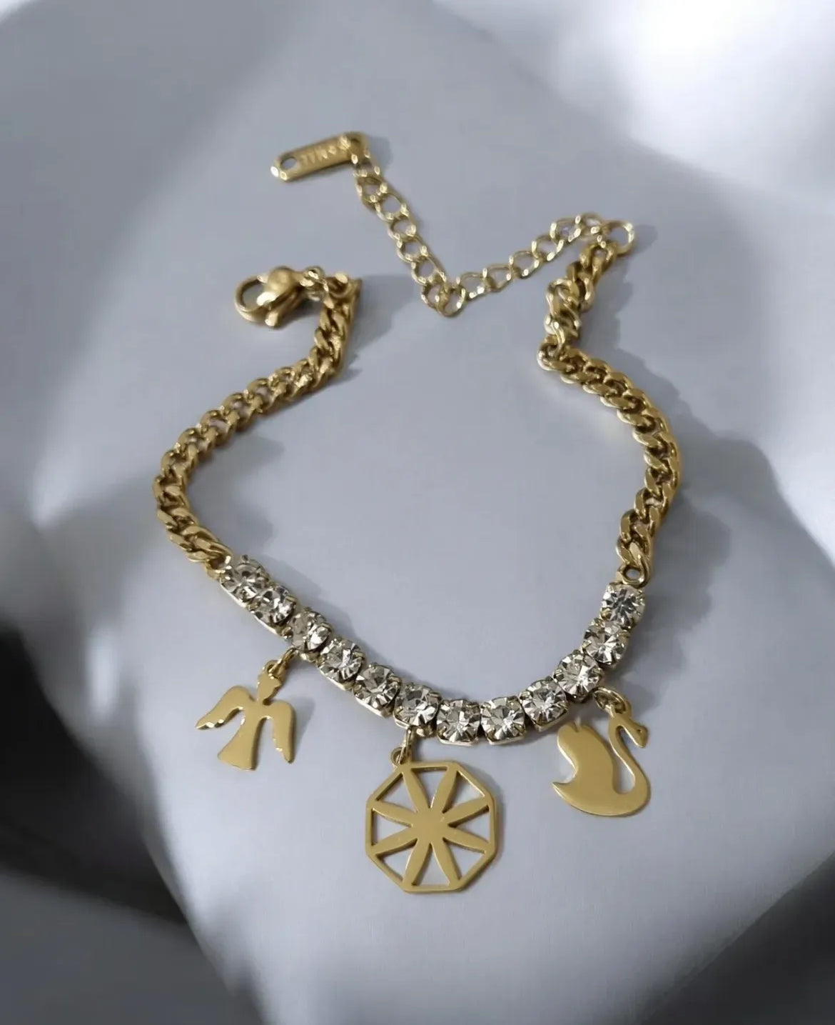 Tennis chain bracelet with charms