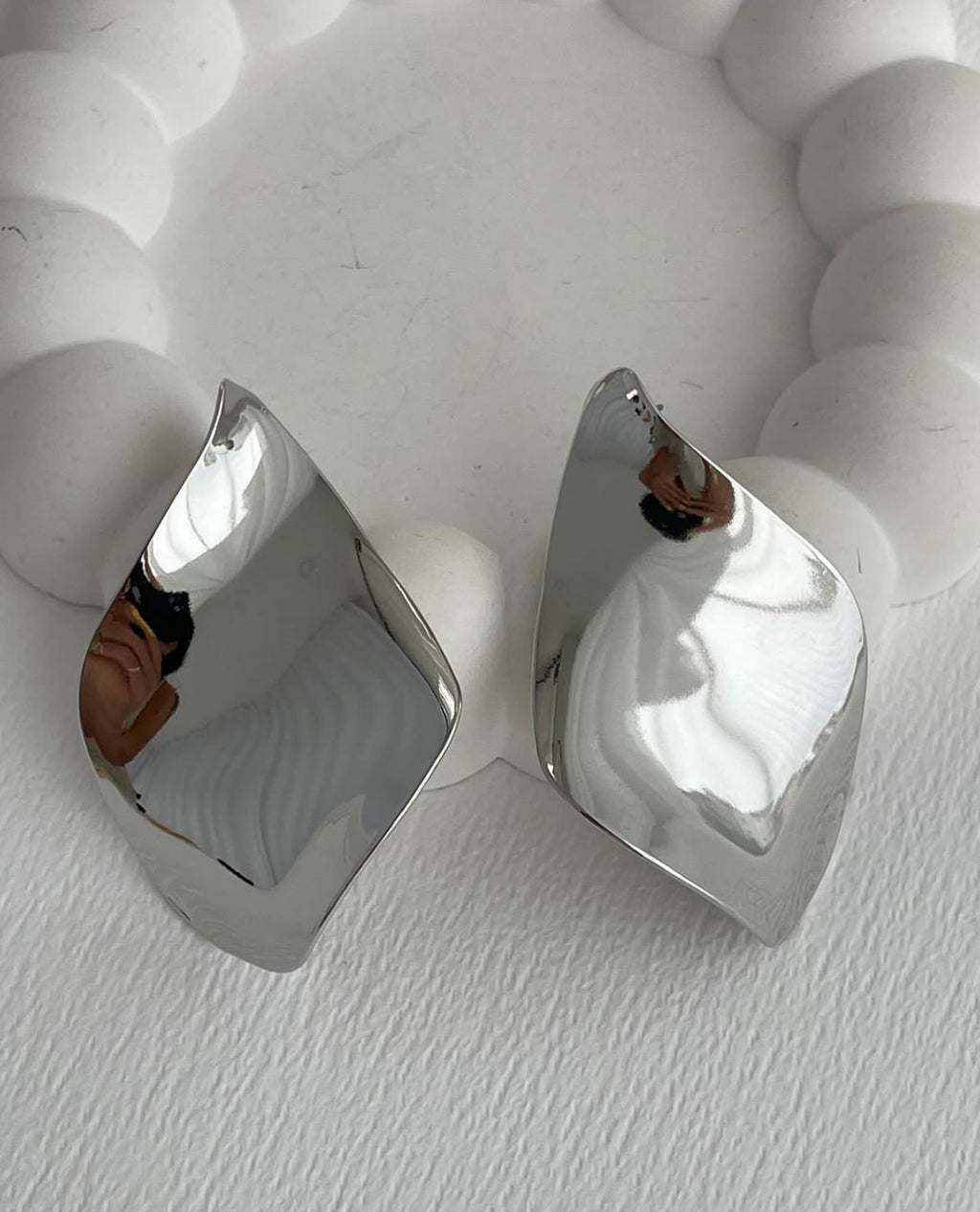 Large curved earrings