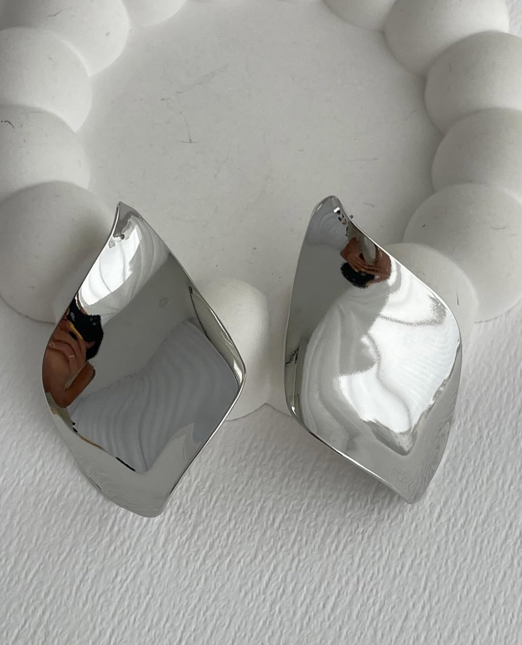Large curved earrings