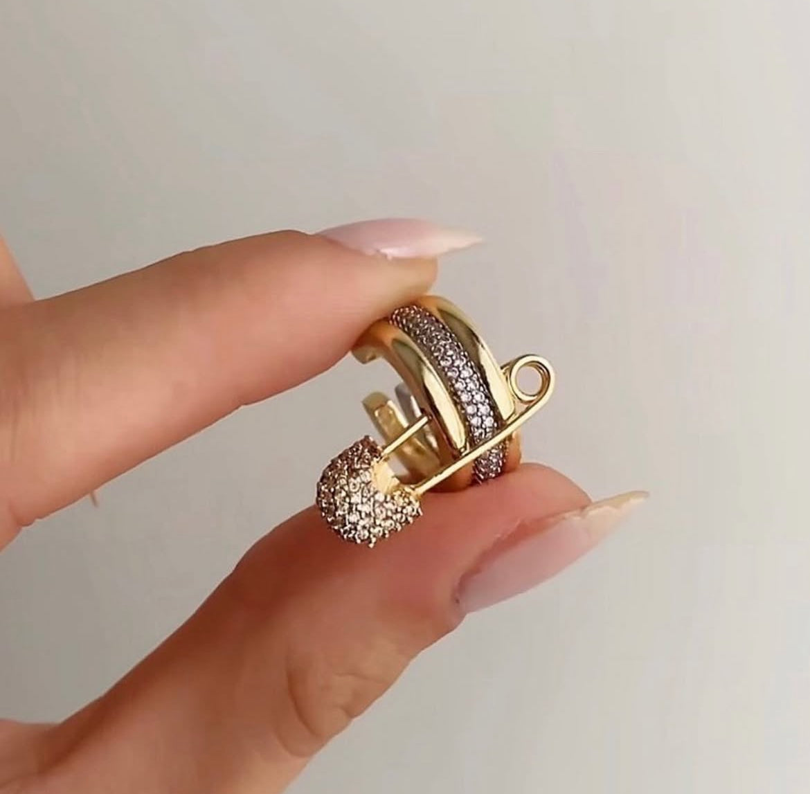 Triple curve ear-cuff